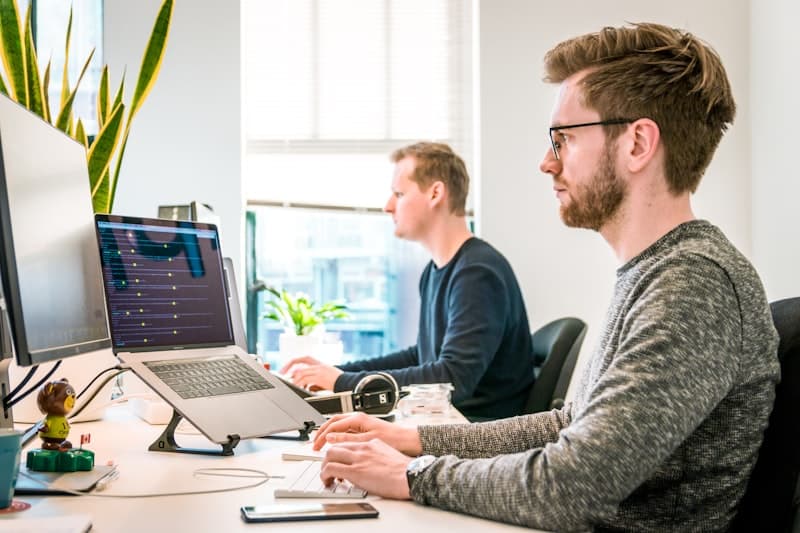 Team working on code at their desk